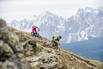 Two mountain bikers in the Dolomites